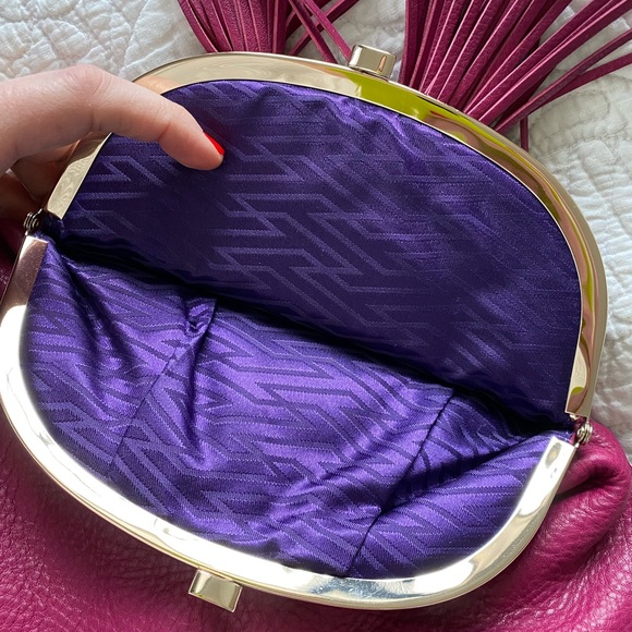 Tumi pink leather clutch w/purple lining and tassels - Picture 5 of 7
